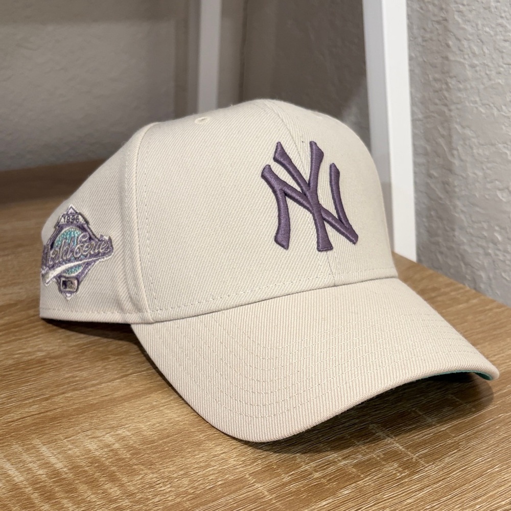 Cream Baseball Cap with Purple Logo